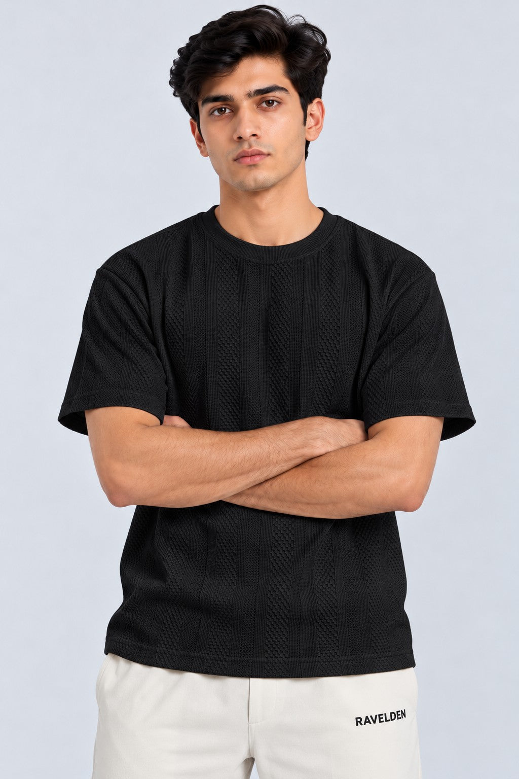 Strata Tee black textured short sleeve tee on model