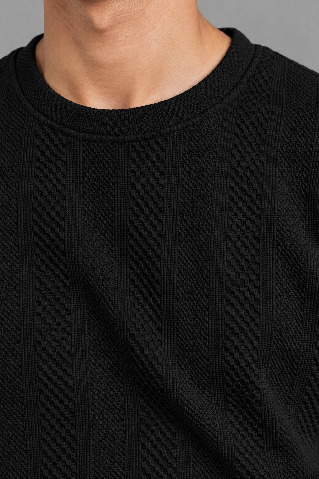 Strata Tee black vertical fabric texture close up